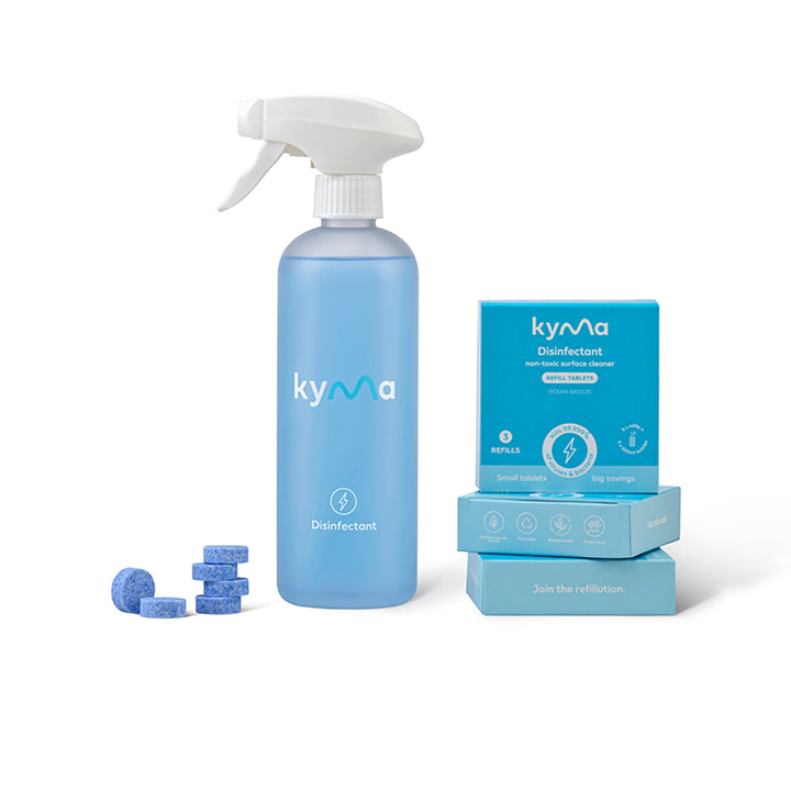 Kyma Disinfectant Bundle featuring a blue reusable spray bottle, disinfectant refill tablets, and eco-friendly packaging.