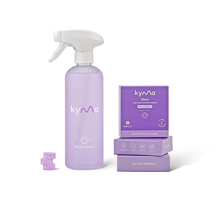 Kyma Glass Cleaner bundle featuring a lavender-colored spray bottle, refill tablets, and eco-friendly packaging designed for streak-free glass and surface cleaning.