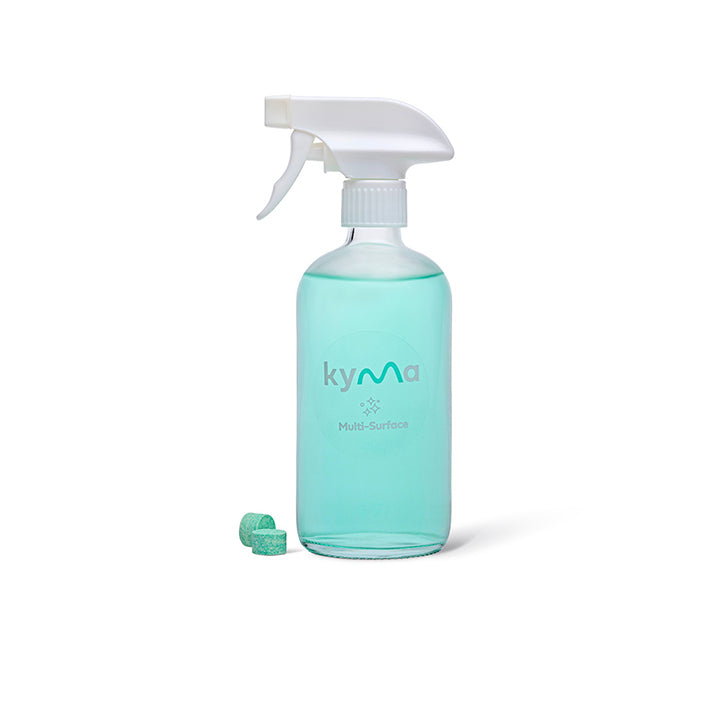 Kyma Glass Multi-Surface Cleaner Kit (500ml) featuring a reusable spray bottle and eco-friendly cleaning concentrate, designed for streak-free shine on glass, mirrors, and various surfaces.